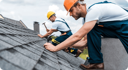 Dakwerkers bezig met een project Dakwerkers bezig met een project